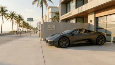 A high-end dark matte sports car parked outside a neon-lit Vice City luxury garage, representing GTA 6 Online economy and progression.